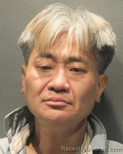 Mugshot of TUAN ANH DANG booked in Arlington County, Virginia on April 24, 2026