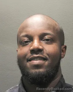 Mugshot of KEVIN DAVID NANGA booked in Arlington County, Virginia on April 25, 2026