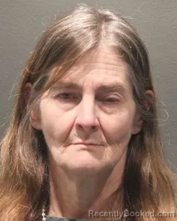 Mugshot of MARY FORRER booked in Arlington County, Virginia on April 27, 2026