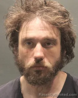 Mugshot of ZACHARY HUGH FOSSETT booked in Arlington County, Virginia on April 28, 2026