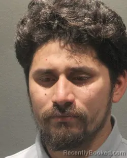 Mugshot of MANUEL ALEXANDER CORONADO booked in Arlington County, Virginia on May 2, 2026