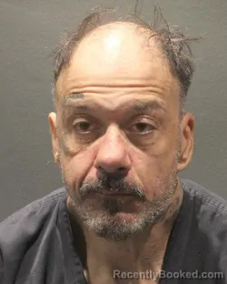 Mugshot of JOHN R GREEN booked in Arlington County, Virginia on May 3, 2026
