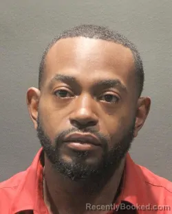 Mugshot of ROBERT WAYNE Junior RHODES booked in Arlington County, Virginia on May 4, 2026
