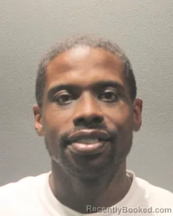 Mugshot of RICARDO SILVESTRE SIMONS booked in Arlington County, Virginia on May 6, 2026