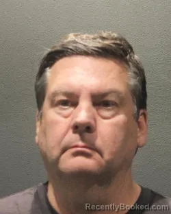 Mugshot of JOHN PAUL WOODS booked in Arlington County, Virginia on May 7, 2026