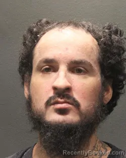 Mugshot of JASON ALONZO CORNEJO booked in Arlington County, Virginia on May 7, 2026