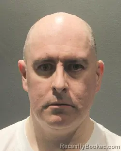 Mugshot of DANIEL FREDERICK BURK booked in Arlington County, Virginia on May 7, 2026