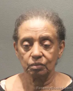 Mugshot of BELETESH OGBE booked in Arlington County, Virginia on May 8, 2026