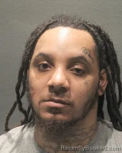 Mugshot of KYM DAJOUR EDMOND booked in Arlington County, Virginia on May 8, 2026