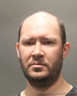 Mugshot of MATTHEW EMMANUEL PULLING booked in Arlington County, Virginia on May 9, 2026