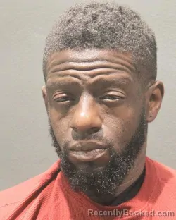 Mugshot of TEJAN SHEKU Junior KOROMA booked in Arlington County, Virginia on May 9, 2026