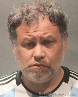 Mugshot of CARLOS GUILLERMO QUIROGA booked in Arlington County, Virginia on May 9, 2026