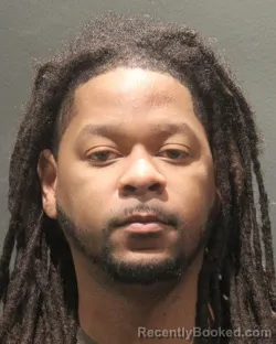 Mugshot of MYLIK MOORE booked in Arlington County, Virginia on May 10, 2026