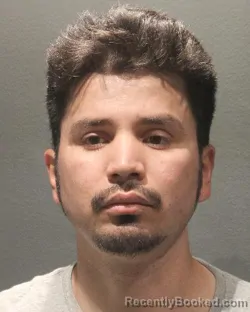 Mugshot of SANTOS PORFIRIO CRUZ ALVAREZ booked in Arlington County, Virginia on May 10, 2026
