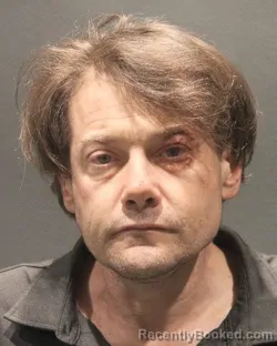 Mugshot of DOUGLAS WILLIAM COURTER booked in Arlington County, Virginia on May 14, 2026