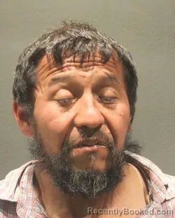 Mugshot of EVER SANTOS GUEVARA booked in Arlington County, Virginia on May 14, 2026
