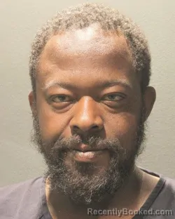 Mugshot of CALVIN N Junior HUGHES booked in Arlington County, Virginia on May 15, 2026