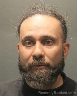 Mugshot of AMANDEEP SINGH RANDHAWA booked in Arlington County, Virginia on May 25, 2026