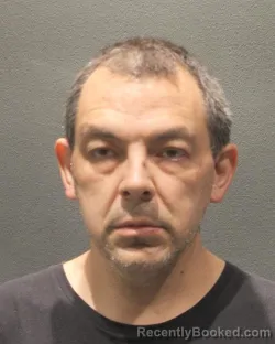 Mugshot of MICHAEL THOMAS LARMIE booked in Arlington County, Virginia on June 18, 2026