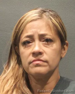 Mugshot of SANDRA ISABEL CISNEROS booked in Arlington County, Virginia on June 20, 2026