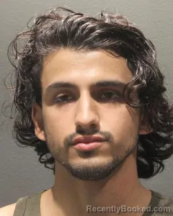Mugshot of MOHAMMED RIYAD AL YEMANY booked in Arlington County, Virginia on June 27, 2026
