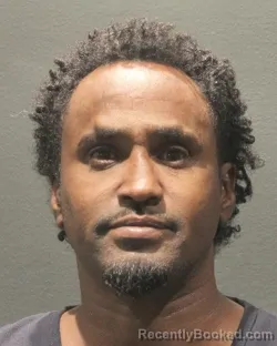 Mugshot of MOHAMED JAMA ABDI booked in Arlington County, Virginia on July 2, 2026