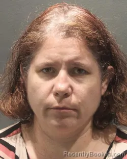 Mugshot of LAURA KIEL booked in Arlington County, Virginia on July 2, 2026