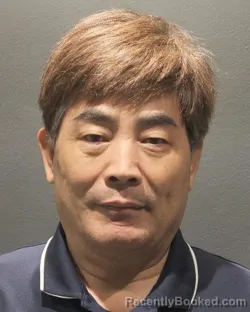 Mugshot of ZHIEN YAN booked in Arlington County, Virginia on July 2, 2026