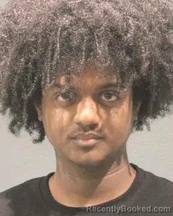Mugshot of DAWIT HAILEDINGLE GIRUM booked in Arlington County, Virginia on July 5, 2026