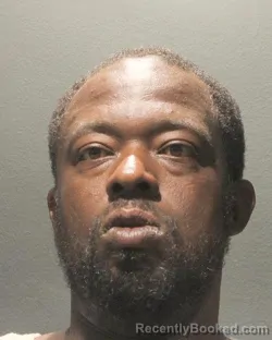 Mugshot of CALVIN NATHANIEL Junior HUGHES booked in Arlington County, Virginia on July 6, 2026