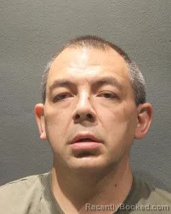 Mugshot of MICHAEL THOMAS LARMIE booked in Arlington County, Virginia on July 7, 2026