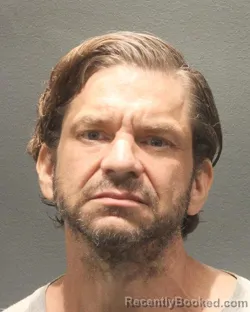 Mugshot of ANDREW SCOTT TAYLOR booked in Arlington County, Virginia on July 8, 2026