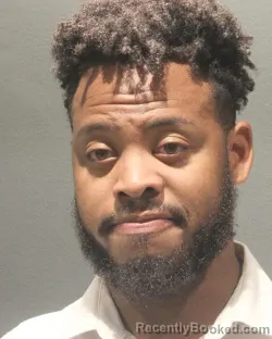 Mugshot of MICAH QUARLES booked in Arlington County, Virginia on July 9, 2026