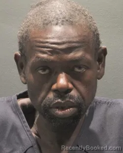 Mugshot of OSCAR NZABARINOA booked in Arlington County, Virginia on July 12, 2026