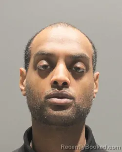 Mugshot of JOTHAM ASFAHA WODAJE booked in Arlington County, Virginia on July 15, 2026