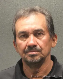Mugshot of Juan Quinteros Merino booked in Arlington County, Virginia on July 26, 2026