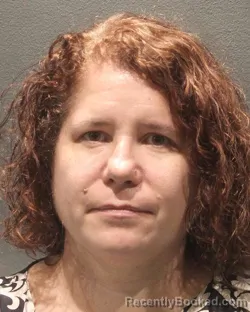 Mugshot of LAURA KIEL booked in Arlington County, Virginia on August 4, 2026