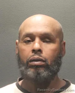 Mugshot of DEVON ELLSWORTH BROWN booked in Arlington County, Virginia on August 4, 2026