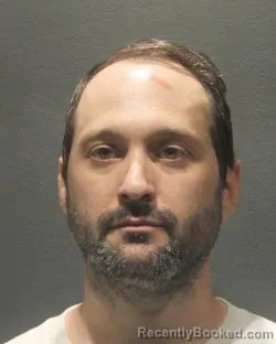 Mugshot of John Brandon Benson booked in Arlington County, Virginia on August 19, 2026