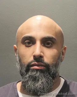 Mugshot of Aman Singh Lail booked in Arlington County, Virginia on August 20, 2026