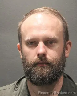 Mugshot of Travis Bomar Robinson booked in Arlington County, Virginia on August 20, 2026