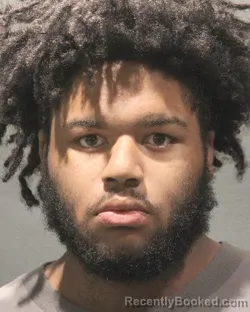 Mugshot of Kharie Clifton Wilson booked in Arlington County, Virginia on August 20, 2026
