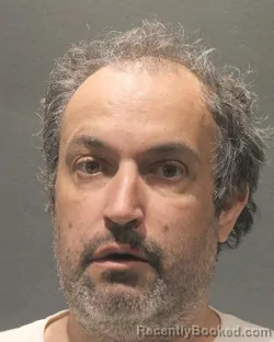 Mugshot of Brennen D Walsh booked in Arlington County, Virginia on August 21, 2026