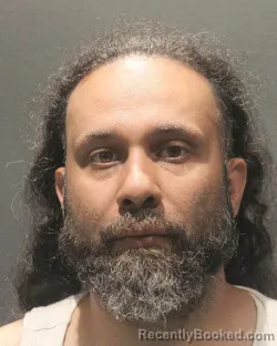 Mugshot of Amandeep Singh Randhawa booked in Arlington County, Virginia on August 22, 2026