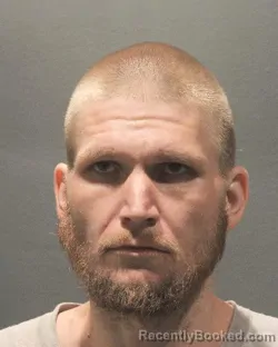 Mugshot of Dustin Gilbert booked in Arlington County, Virginia on August 23, 2026