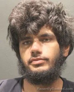 Mugshot of Mohammad Yousufi booked in Arlington County, Virginia on August 23, 2026