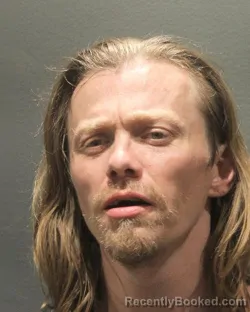 Mugshot of Zachary Edmond Thomas booked in Arlington County, Virginia on August 24, 2026