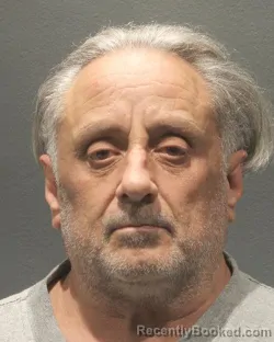 Mugshot of Brian Alexander Taulton booked in Arlington County, Virginia on August 24, 2026