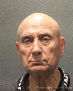 Mugshot of Khalid Mahmood Akhtar booked in Arlington County, Virginia on August 24, 2026