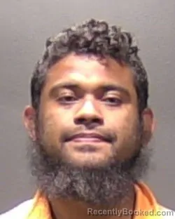 Mugshot of Jose Abraham Serrano Carias booked in Arlington County, Virginia on August 26, 2026
